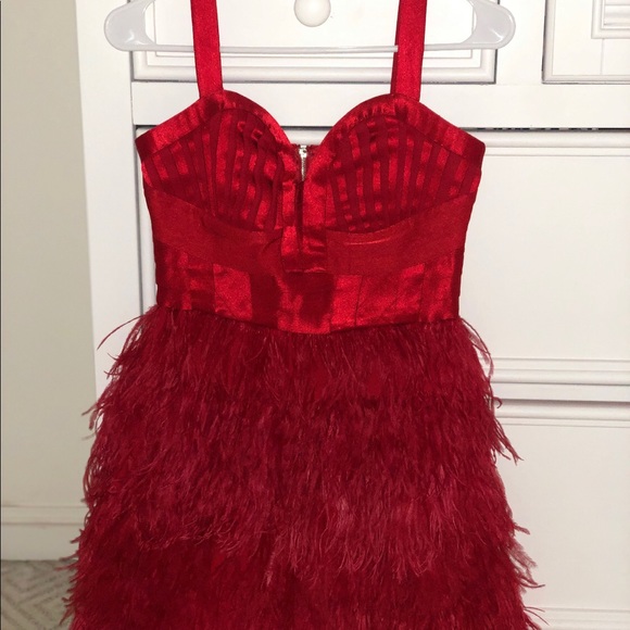 bebe Dresses & Skirts - Red feathered Mini Dress